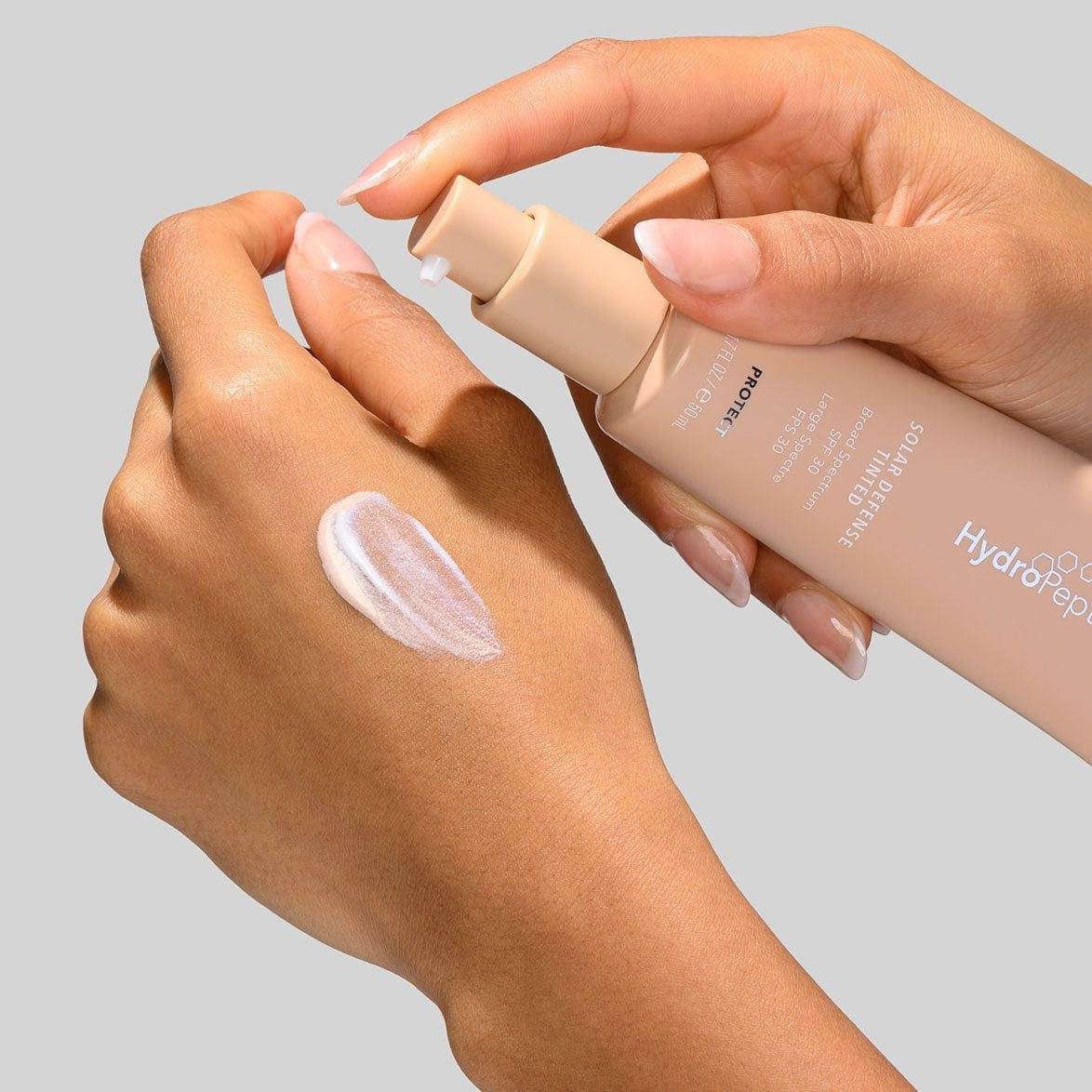 img 2044 - Сонцезахисний крем для обличчя з тоном Hydropeptide Solar Defense Tinted SPF30 50мл